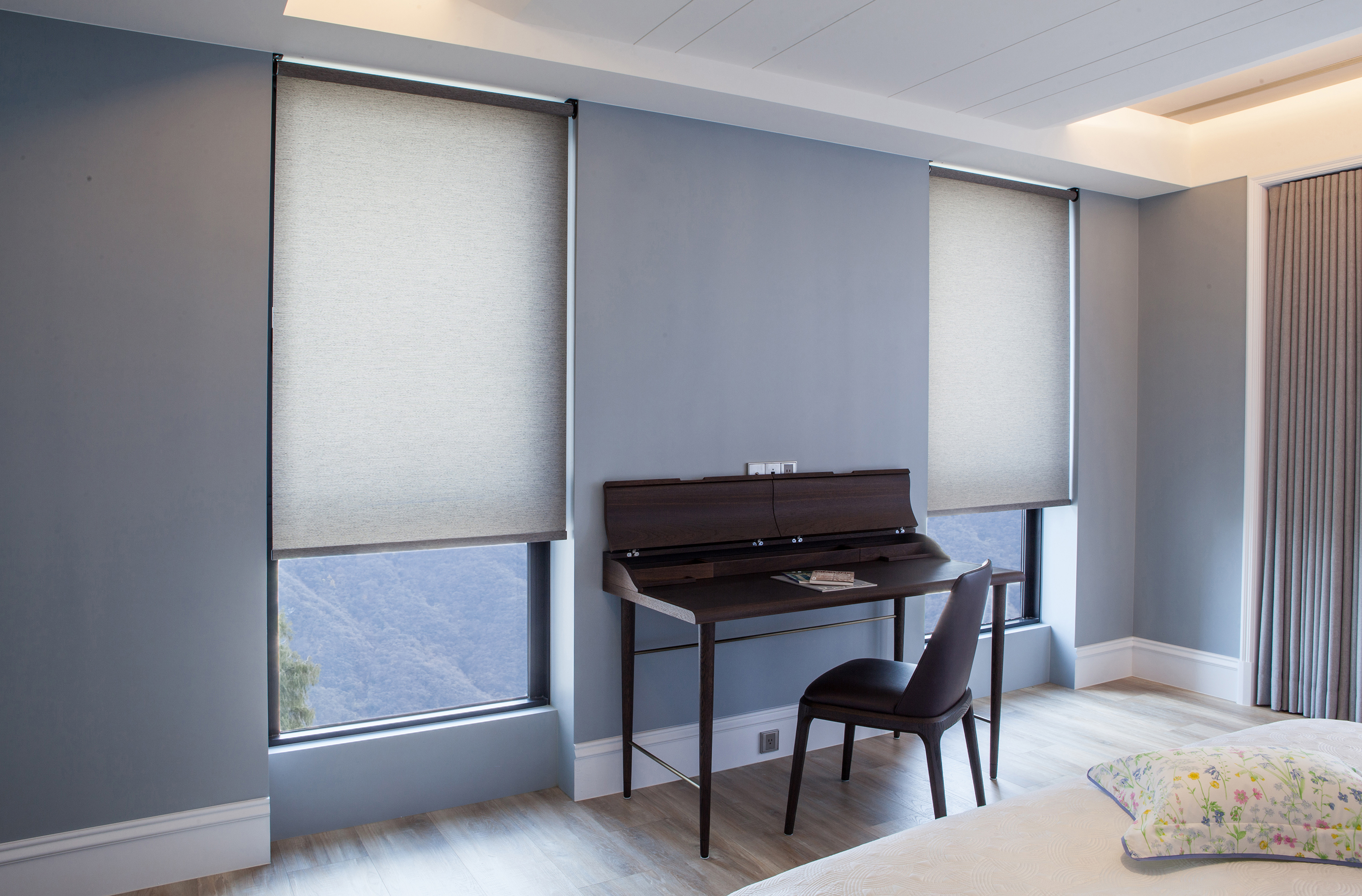 grey light filtering roller blinds by VistaShades Kamloops