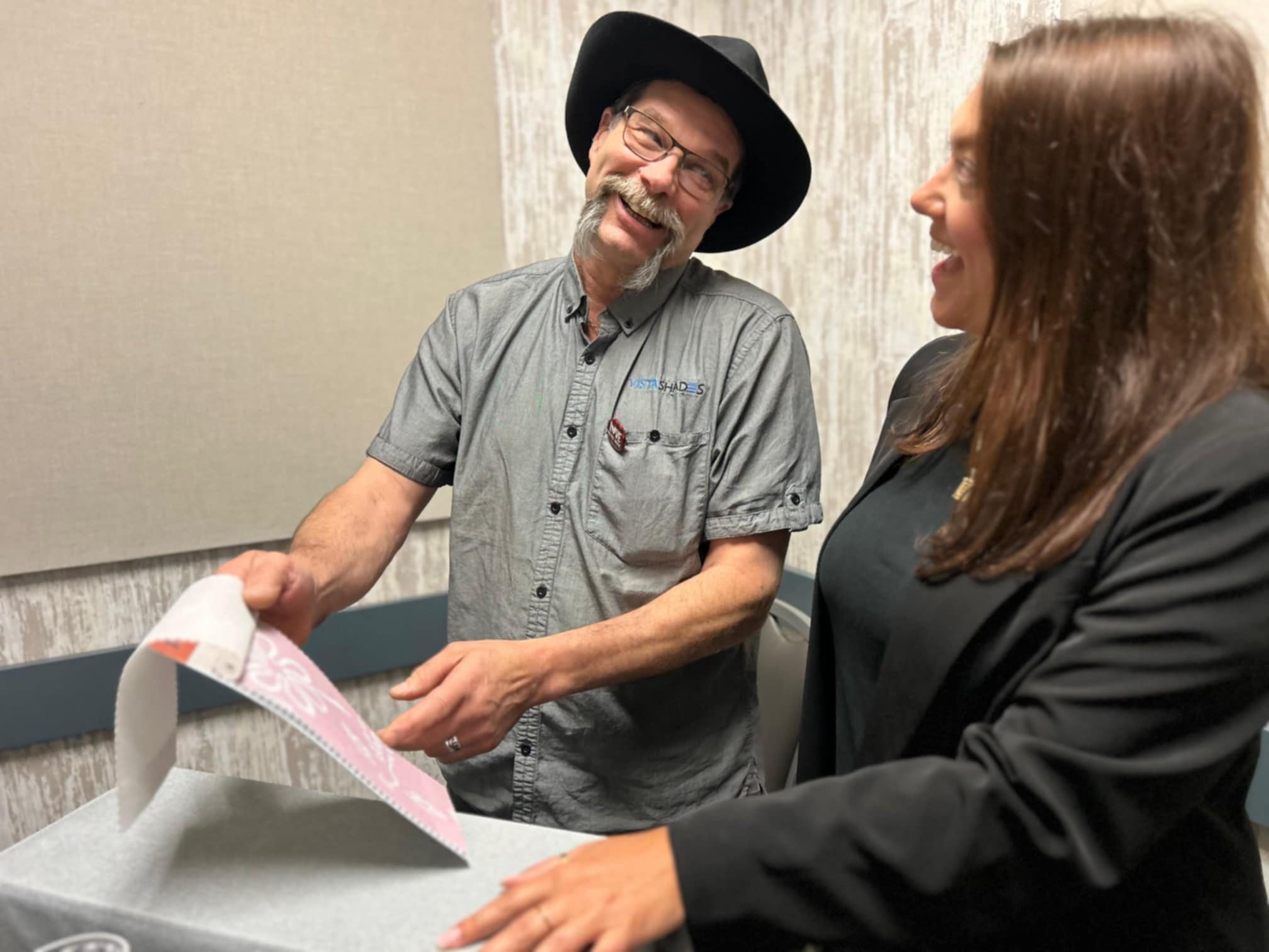 Dave showing samples of product to client