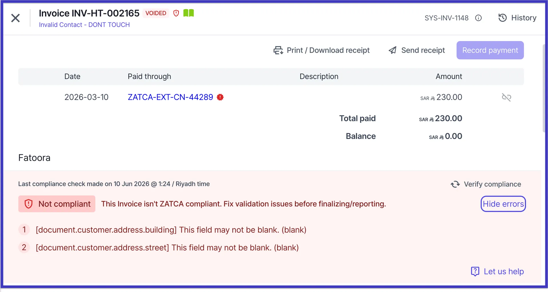 Wafeq's invoice editor showing an inline validation prompt
