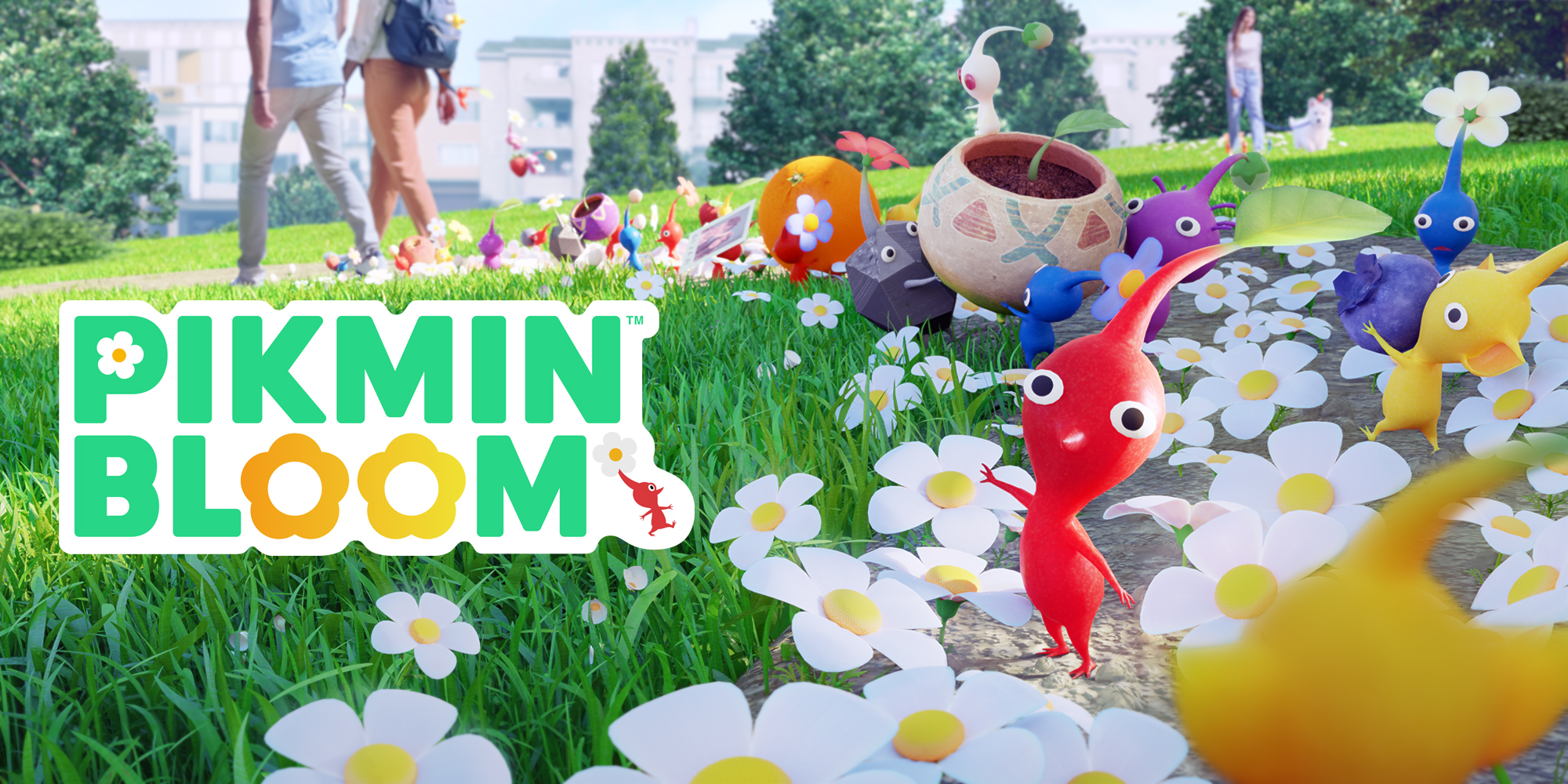 Pikmin Bloom key art: red, blue, yellow and purple Pikmin among white flowers on a park path while people walk by