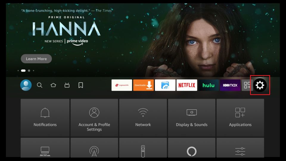 Firestick home screen with settings icon highlighted.