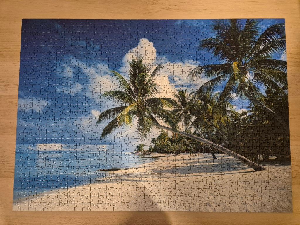 Puzzle: Palmenstrand von Ravensburger (1000 Teile) - Wanderpuzzle