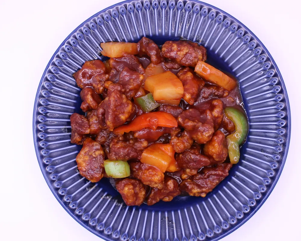 L21 Porc sauté à la sauce aigre - douce 