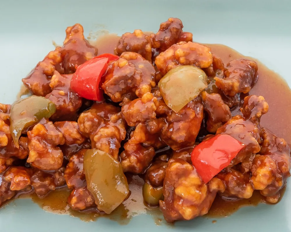 L32 Poulet sauté à la sauce aigre-douce