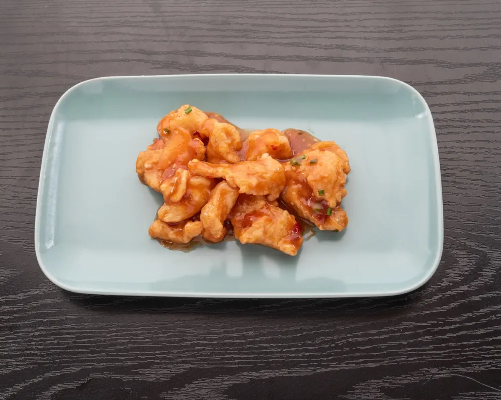 L65 Poisson sauté à la sauce piquante