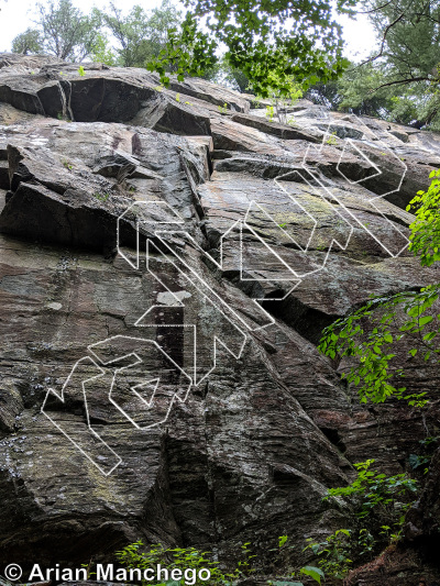 photo of Le Fétichiste, 5.11b  at Mur des Gauchistes from Québec: Lac Long