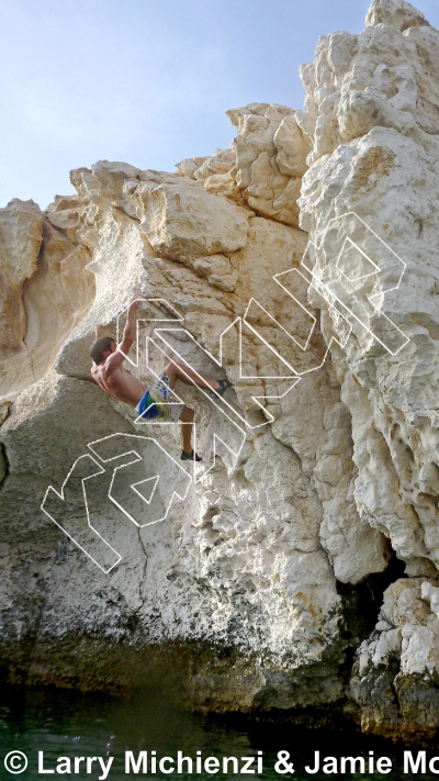 photo of Pockets Overhang, V4 ★ at First Aretes from Oman: Deep-Water Soloing