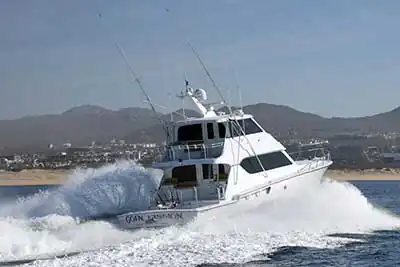 Goin' Fission | Sportfishing boat moving fast through the water with large splashes. Cabo San Lucas, Mexico.2024