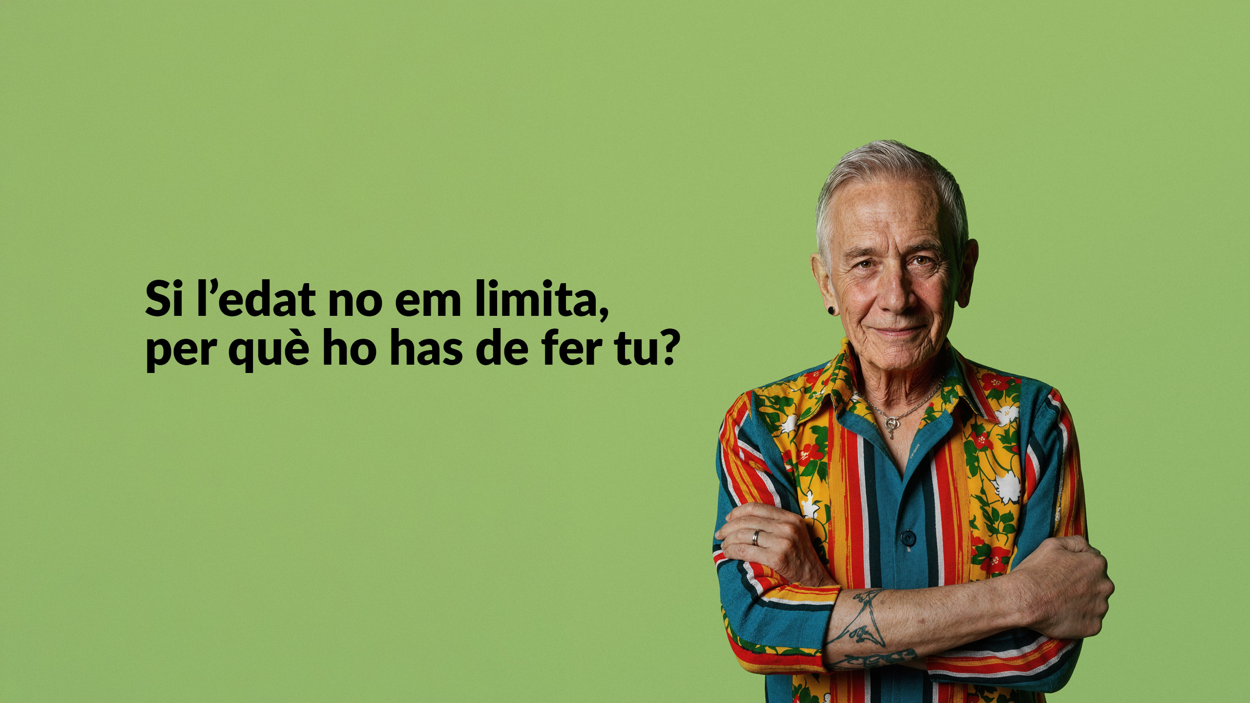Home gran amb camisa acolorida i braços creuats sobre fons verd, al costat del text 'Si l'edat no em limita, per què ho has de fer tu?'.