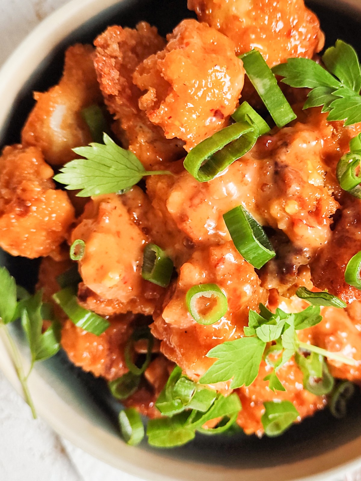 Crispy Bang-Bang Cauliflower - Bang Bang cauliflower in a bowl