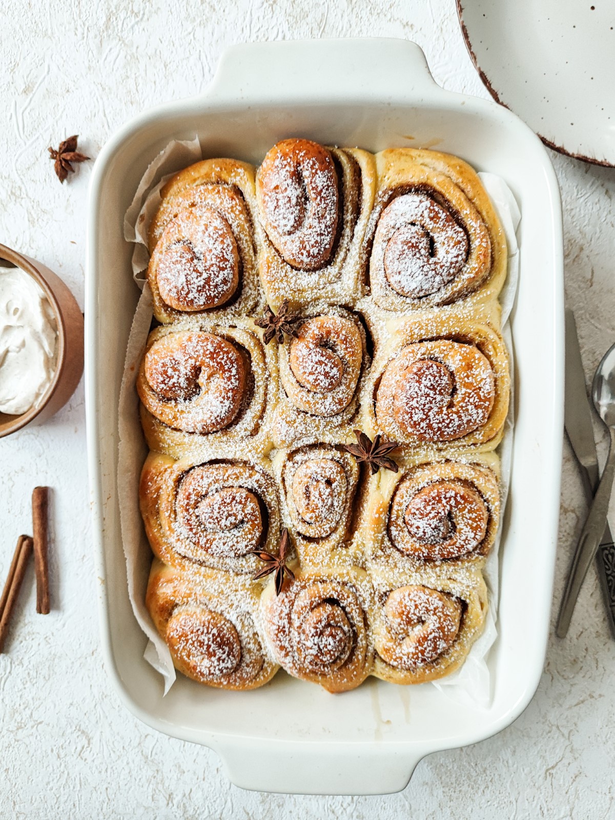 Milk Bread Cinnamon Rolls - Milk bread cinnamon rolls in a white baking tray