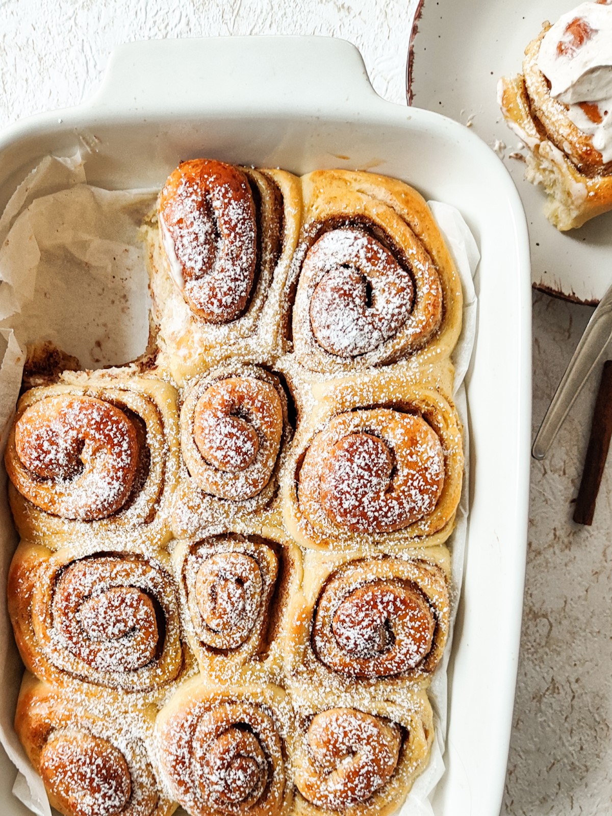 Milk Bread Cinnamon Rolls - Milk bread cinnamon rolls in a white baking tray