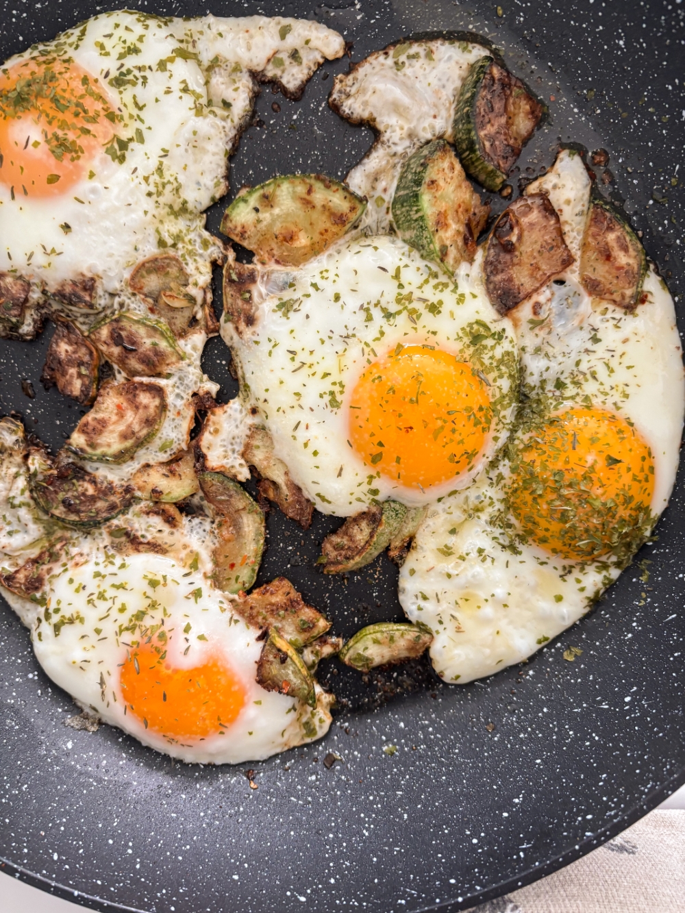 Zucchini and Egg Skillet  - Zucchini with eggs in a skilled 