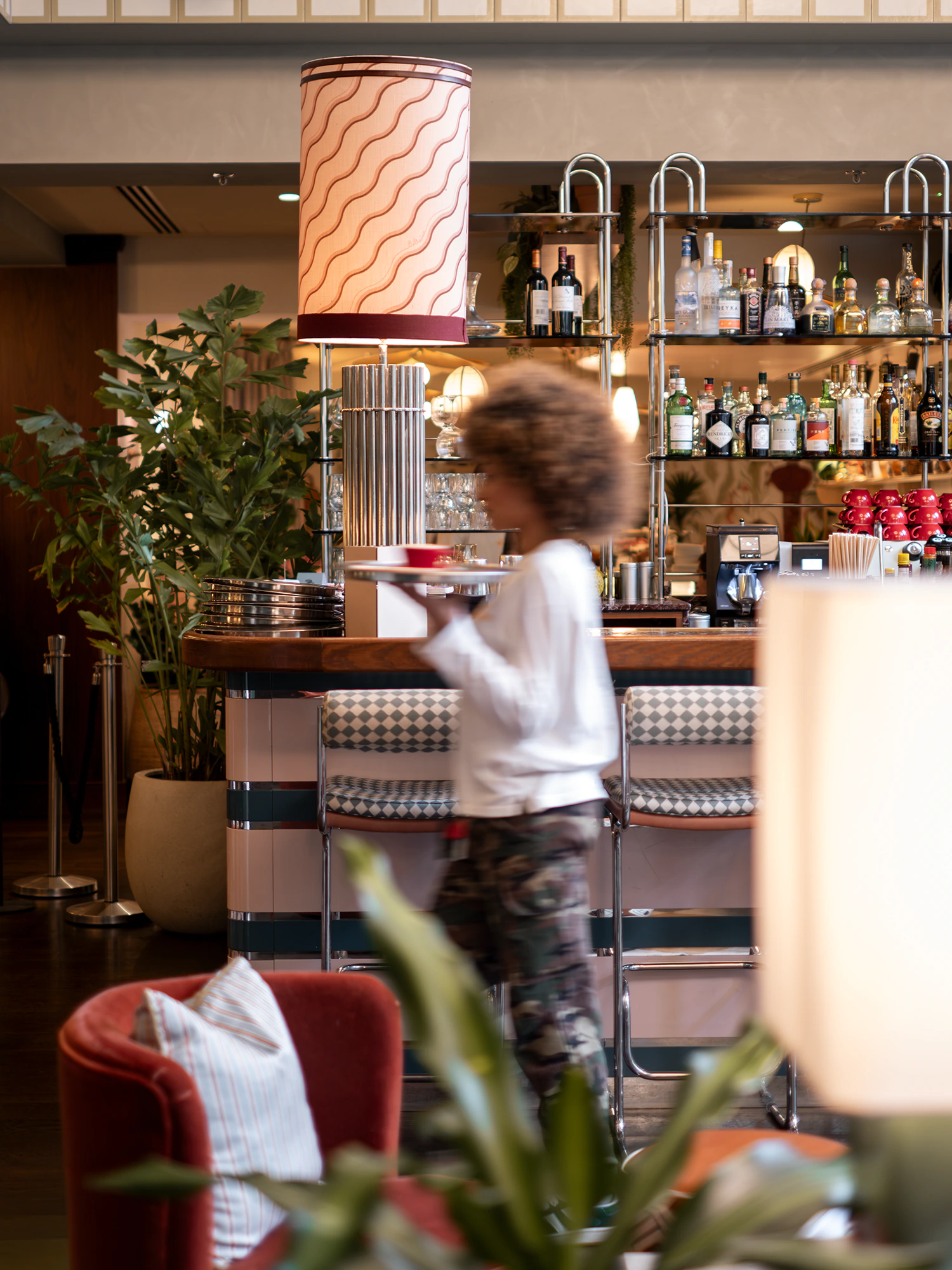 waitress in the bar at the Hoxton Brussels