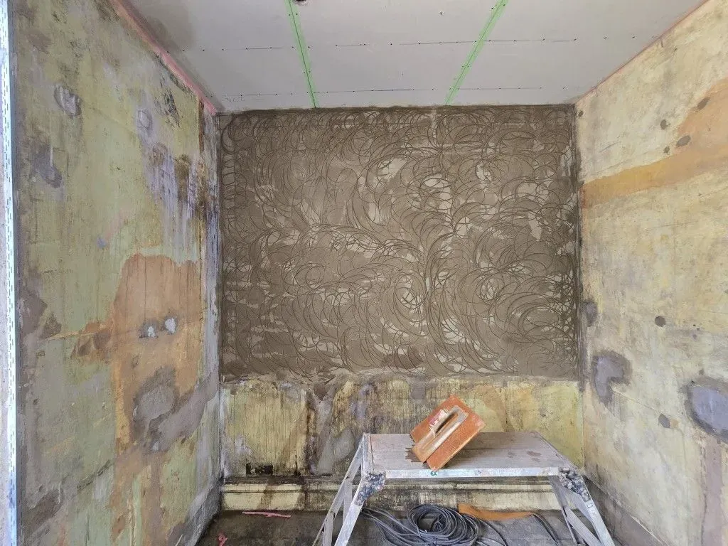 Interior wall rendering and green-taped plasterboard ceiling preparation for a kitchen and dining room renovation in Redland by JNS Plastering Services, Bristol BS6.