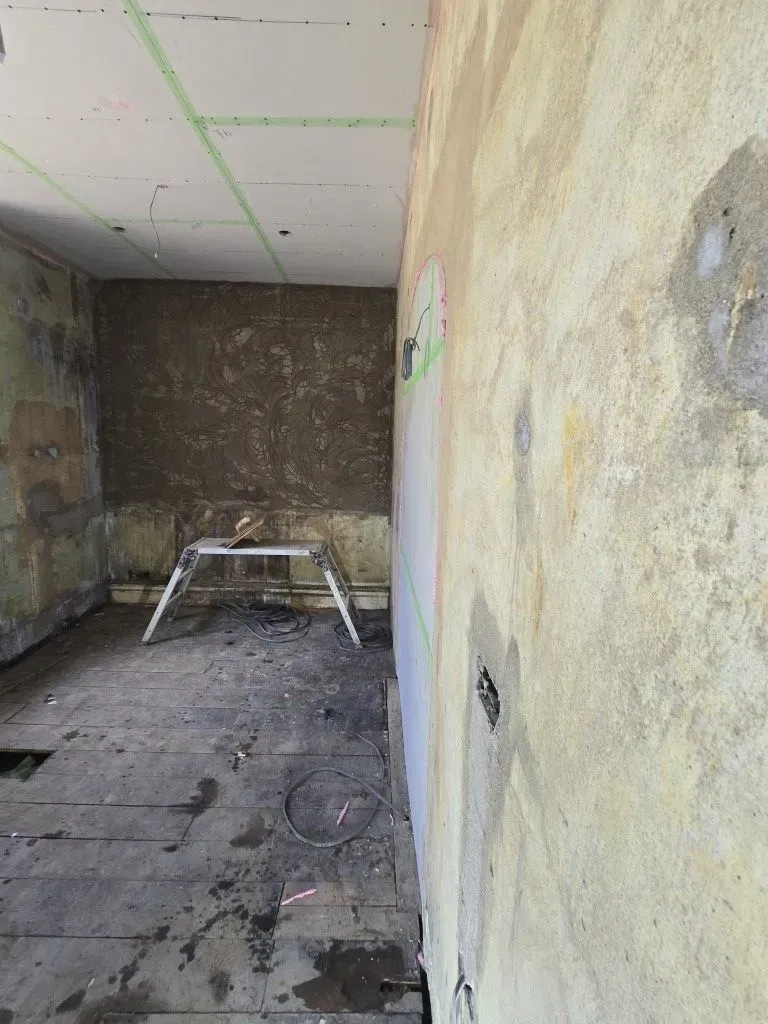 Interior wall rendering and green-taped plasterboard ceiling preparation for a kitchen and dining room renovation in Redland, Bristol BS6.
