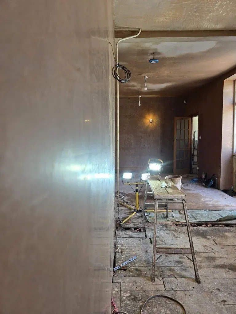 Smooth, high-quality wall finish by JNS Plastering Services, showing expert skimming work in a Redland residential project.