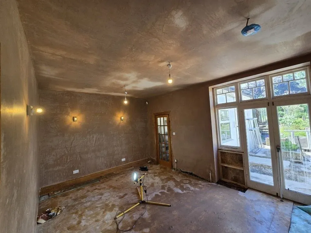 Freshly skimmed plaster finish on walls and ceiling of a large open-plan kitchen-diner renovation in Redland, Bristol BS6 7TQ
