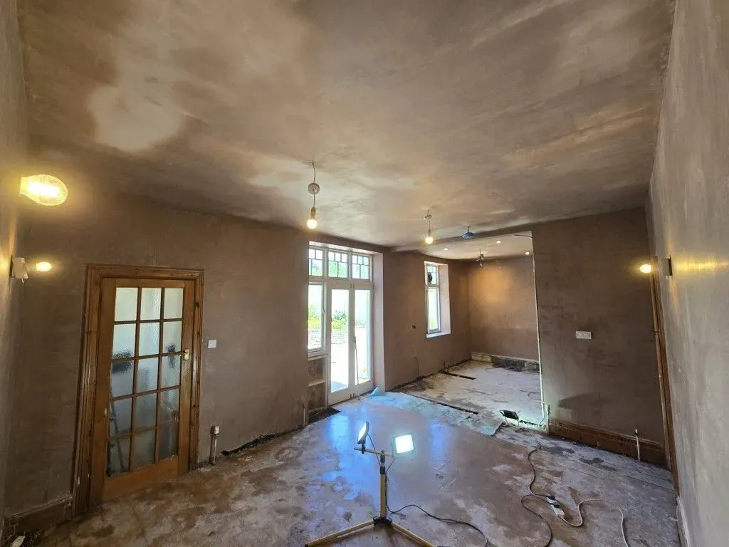 Freshly skimmed plaster finish on walls and ceiling of a large open-plan kitchen-diner renovation in Redland, Bristol BS6.