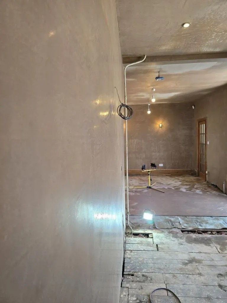 Smooth plaster skimming finish on a freshly completed wall for a kitchen and dining room renovation in Redland, Bristol BS6.