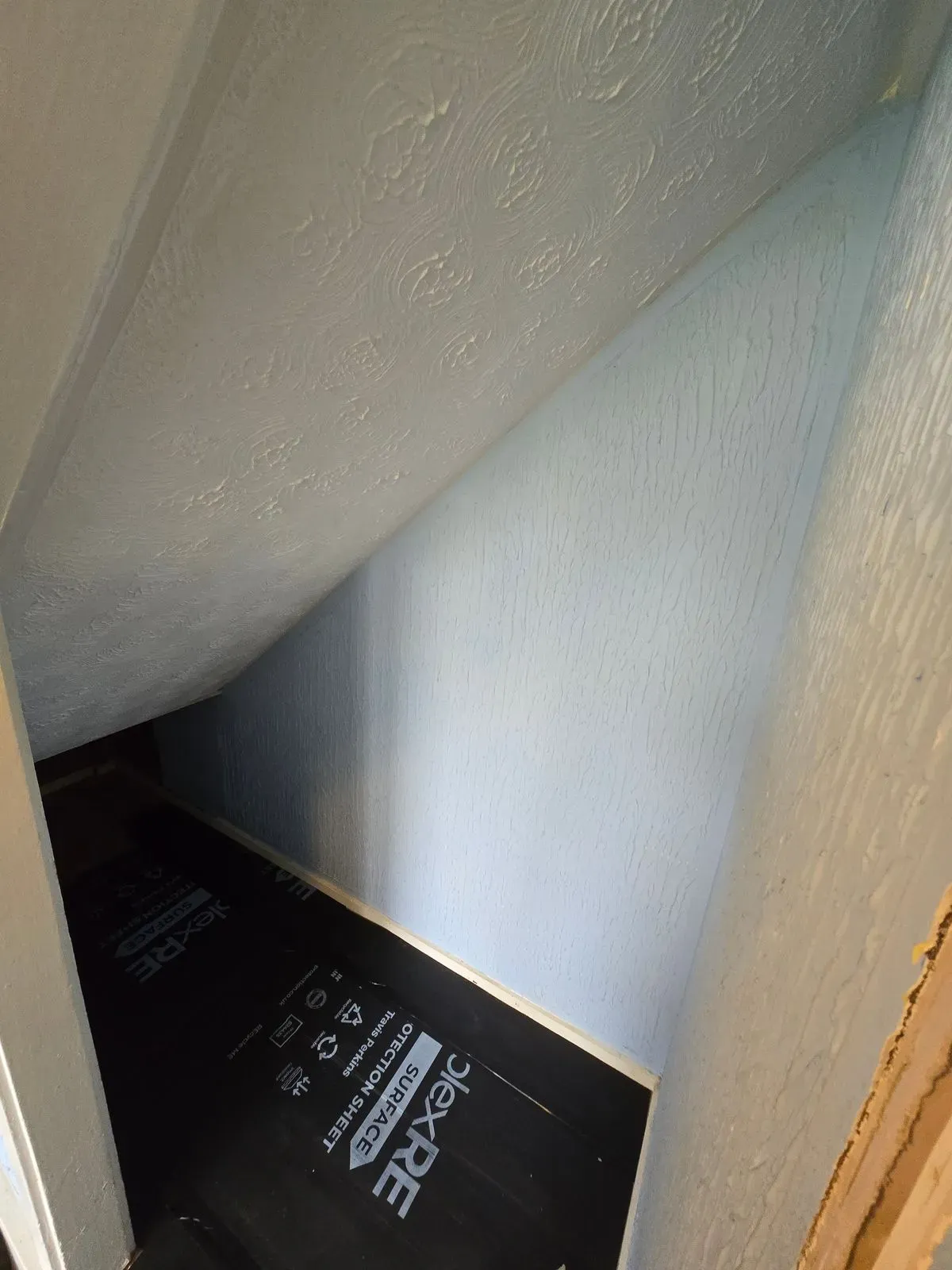 Prepping internal angles and under-stairs area for Artex flattening and skimming
