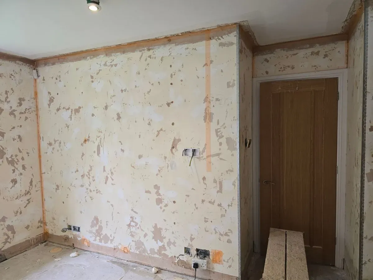 Professional plastering prep in Westbury-on-Trym, applying scrim tape to joints and high-grip bonding for a long-lasting finish.