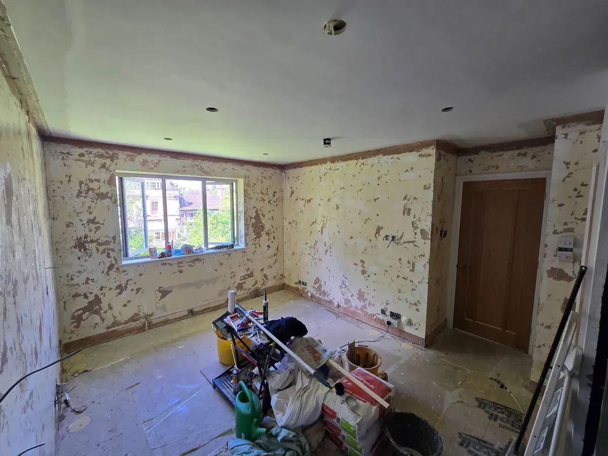 Master bedroom wall preparation in Westbury-on-Trym BS9, stripping old wallpaper and prepping surfaces for professional plastering