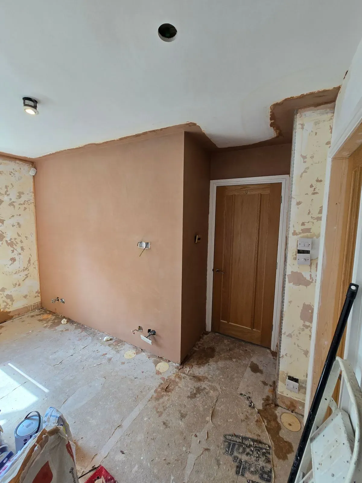 1 Expert plaster patch repair and ceiling blending after old coving removal in a Bristol master bedroom renovation.