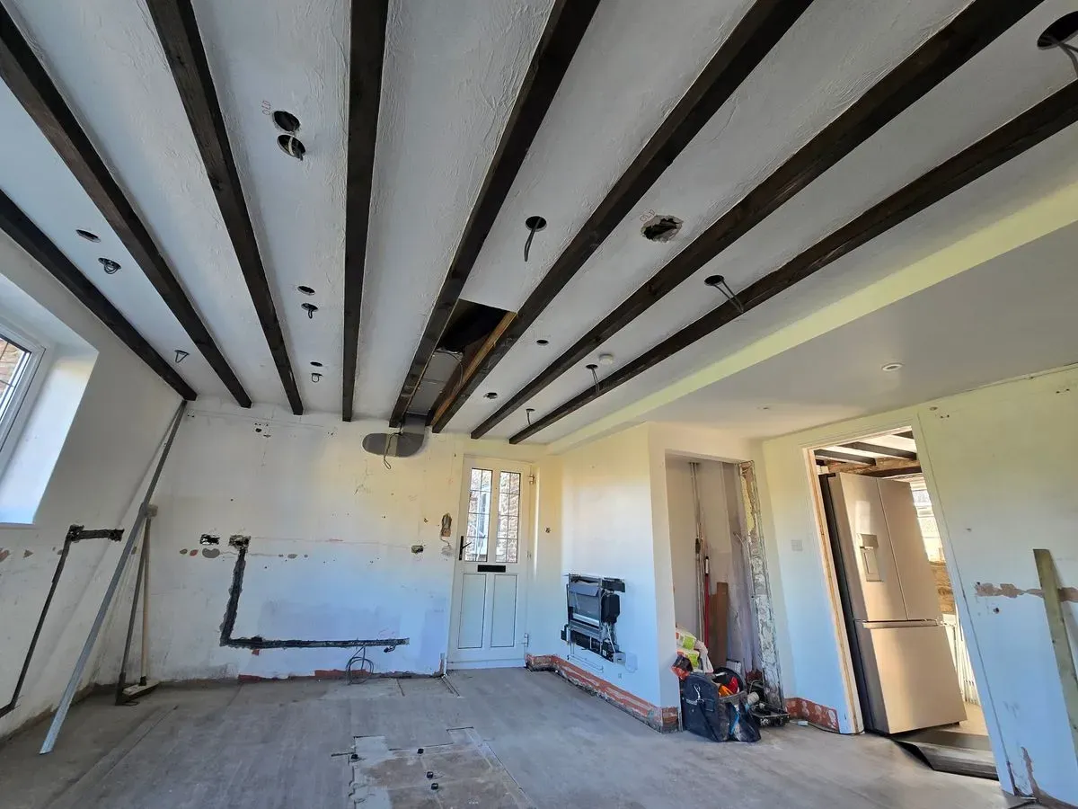 before Professional ceiling prep and masking around traditional dark wood beams in Rangeworthy
