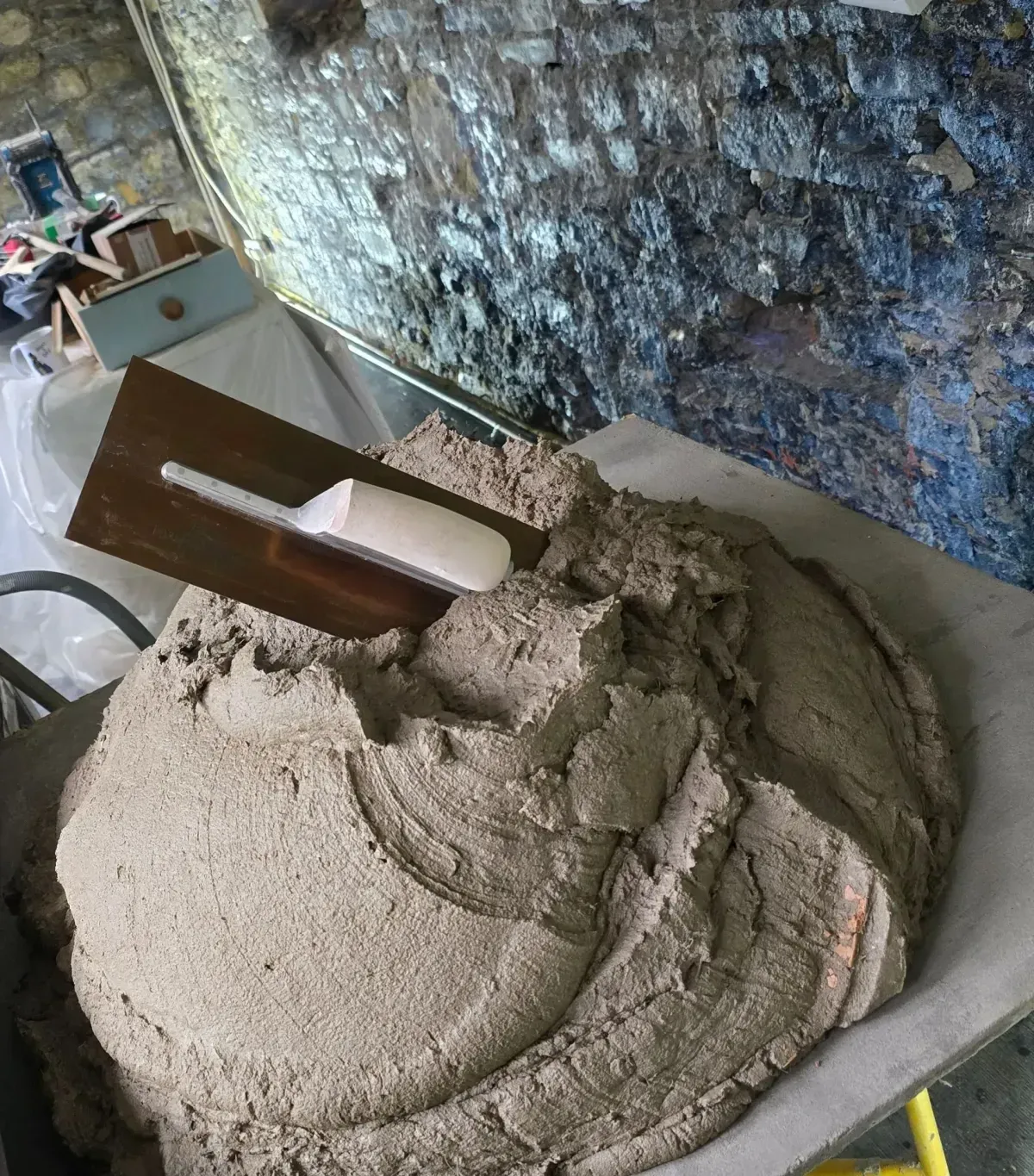 waterproof sand and cement mix with added 20mm fibers and plasticiser to help with strength and reduce cracking and shrinking and a new Marshall town curry rendering trowel