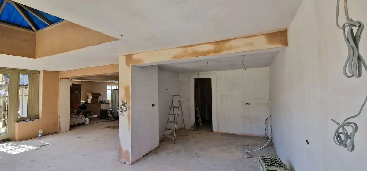 Kitchen and orangery room plastering in Almondsbury, Bristol. Blue grit prep and mesh taping for a smooth skim finish.