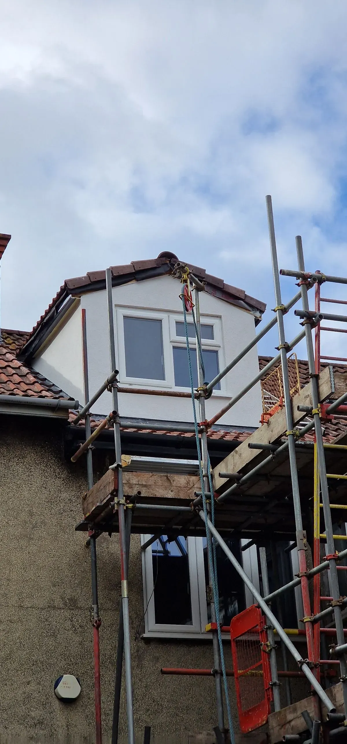 Small attic dormer rendered in Henleaze Bristol BS9 KREND Thin Coat System Silicone rendering