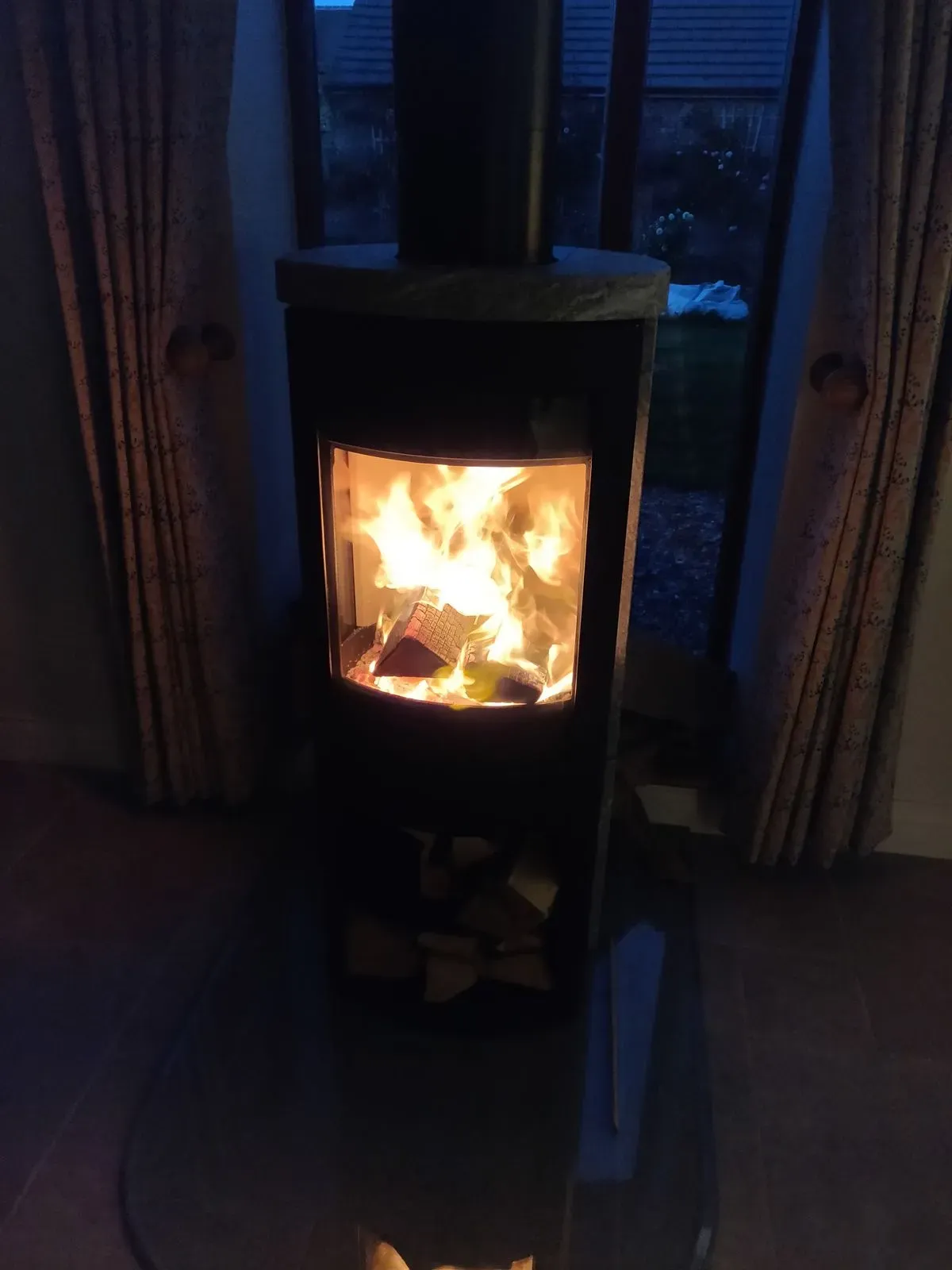 magical flames on this freestanding cylindrical Jotal F370 series cast iron stove by Rugeley Fireplaces Rugeley