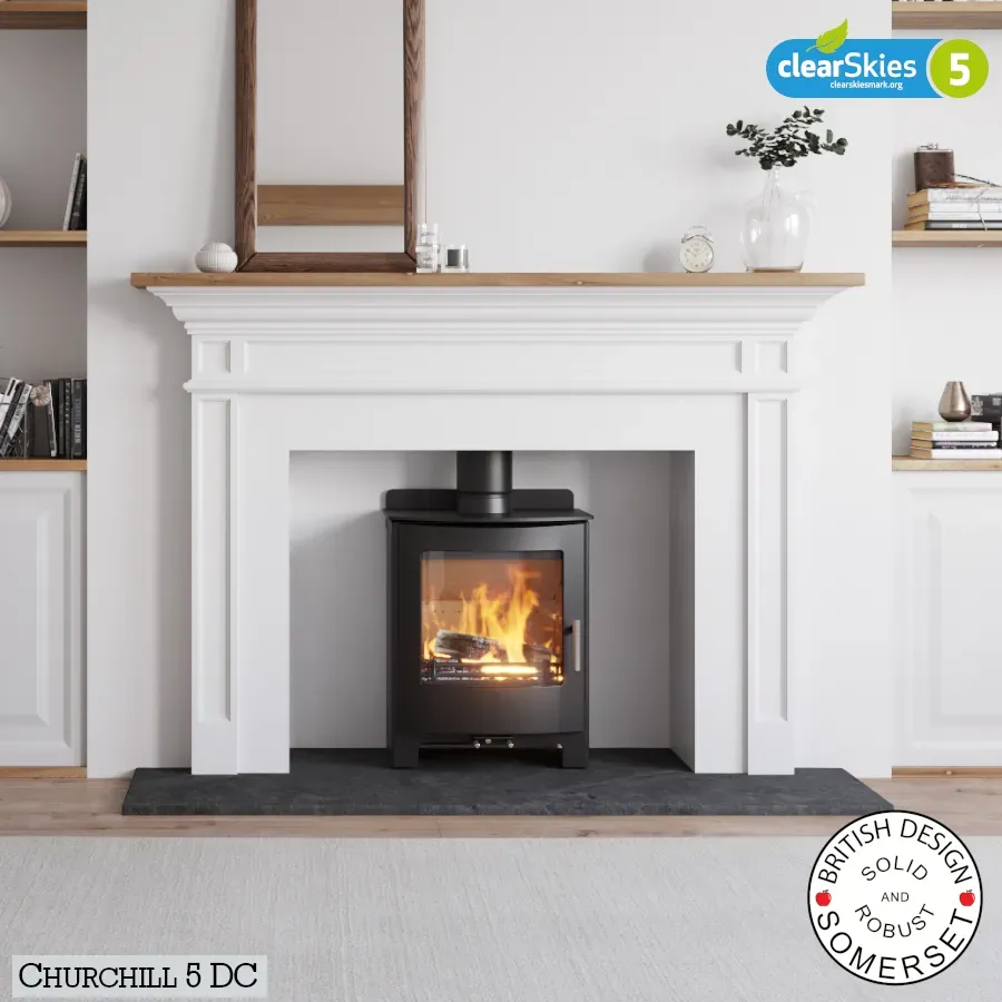 Eurostove Churchill 5 ECO Multifuel Wood stove shown in a white fireplace- Rugeley Fireplaces