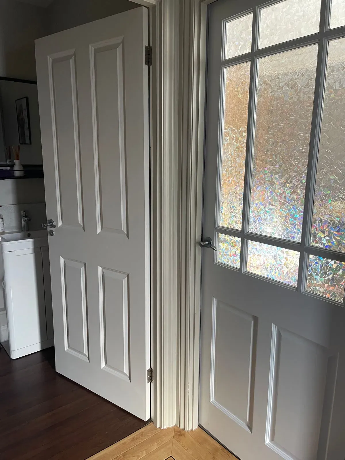 As you enter through the front door, the toilet is opposite 