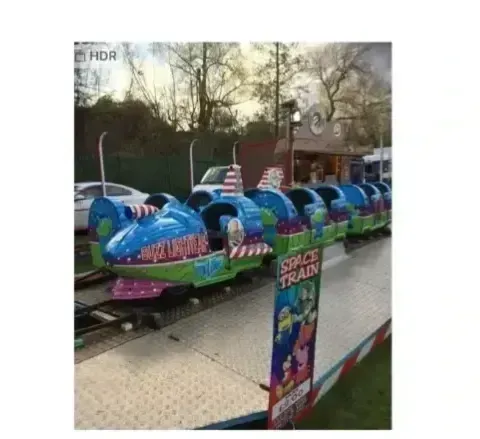 A vibrant funfair scene in York with various rides