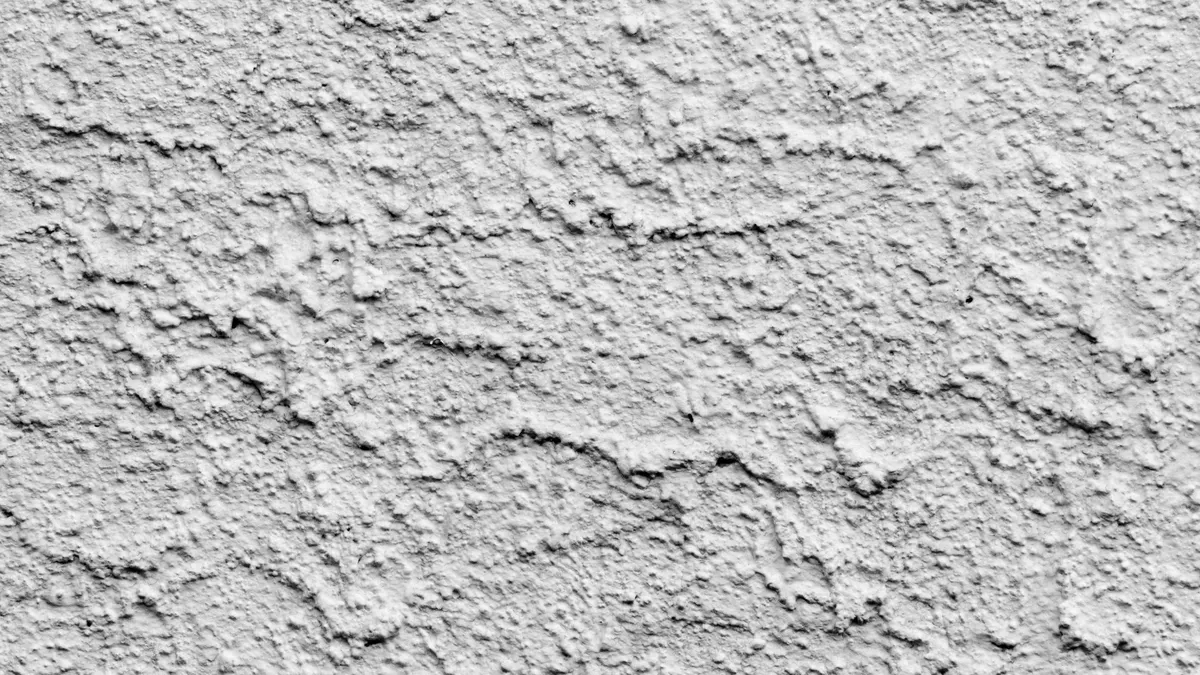 Plastering a wall in Dunmow