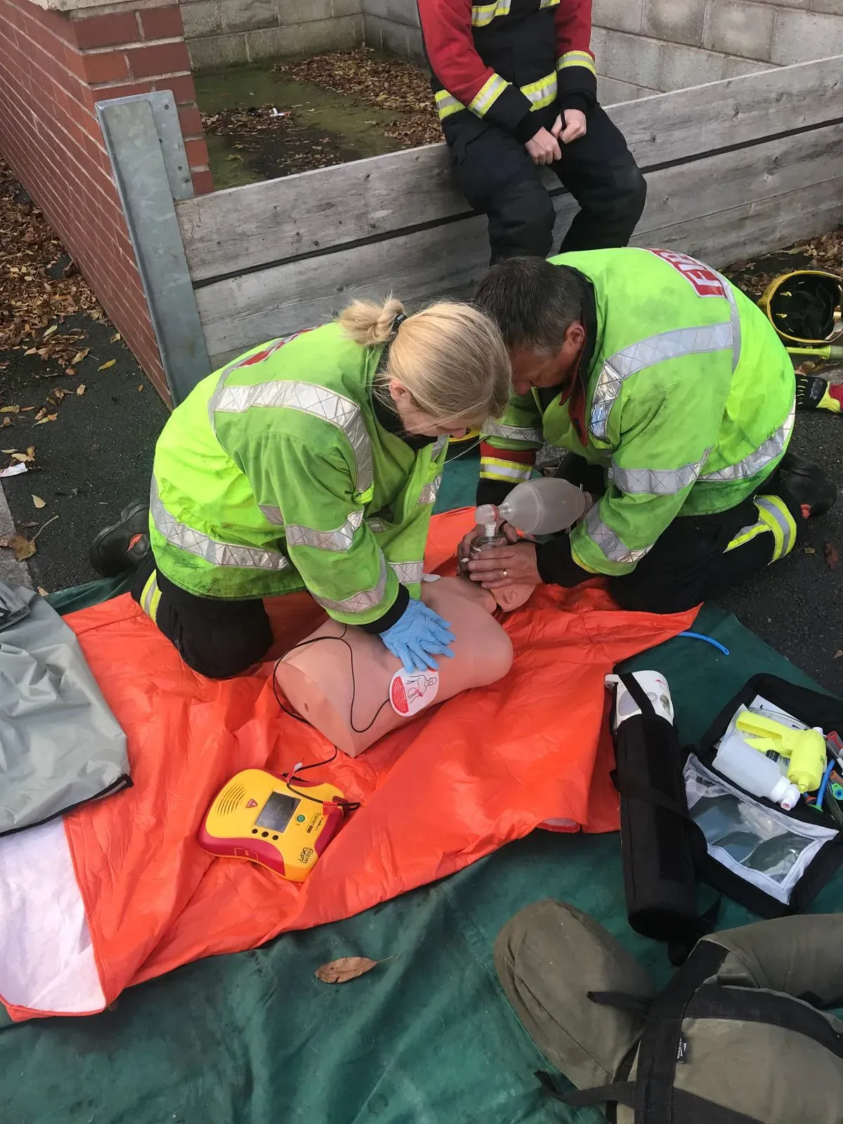Automated external defibrillator (AED) training image background image
