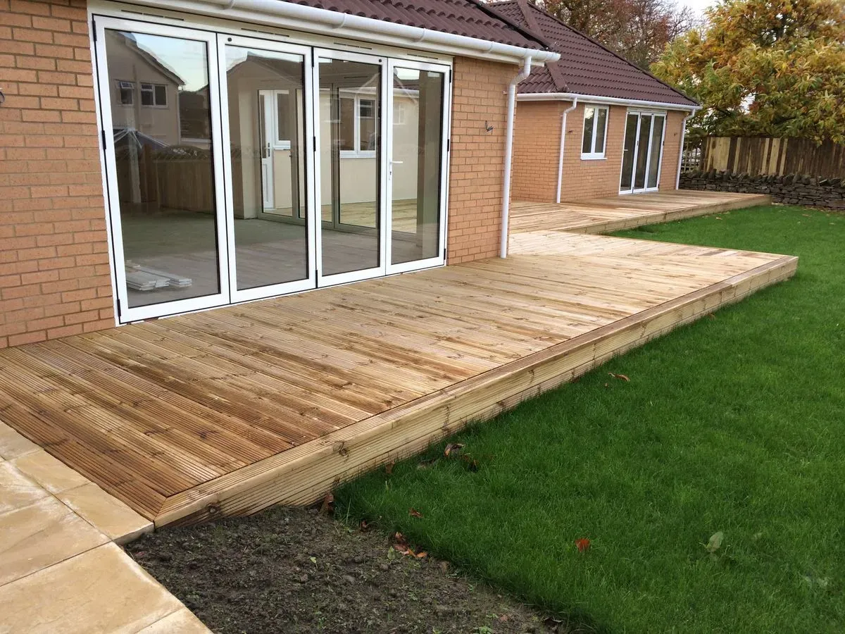 Fencing, decking, patios and landscaping, natural stonework, repointing - traditional and modern, grass cutting, hedge trimming, power washing, fitting shelves, curtain poles and TV brackets, flat pack furniture, odd jobs, building sheds and garden rooms, digger and driver hire image