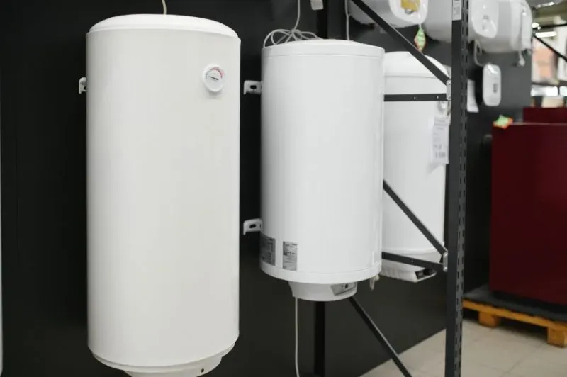 Local technician servicing a boiler in a modern London flat