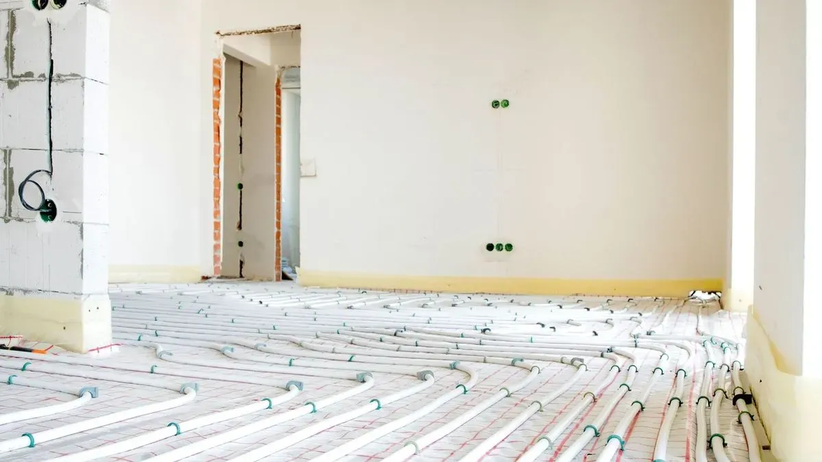Local technicians installing underfloor heating in Clapham