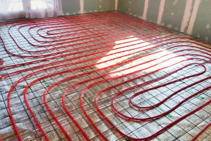 Warm floor system being laid in a Clapham flat