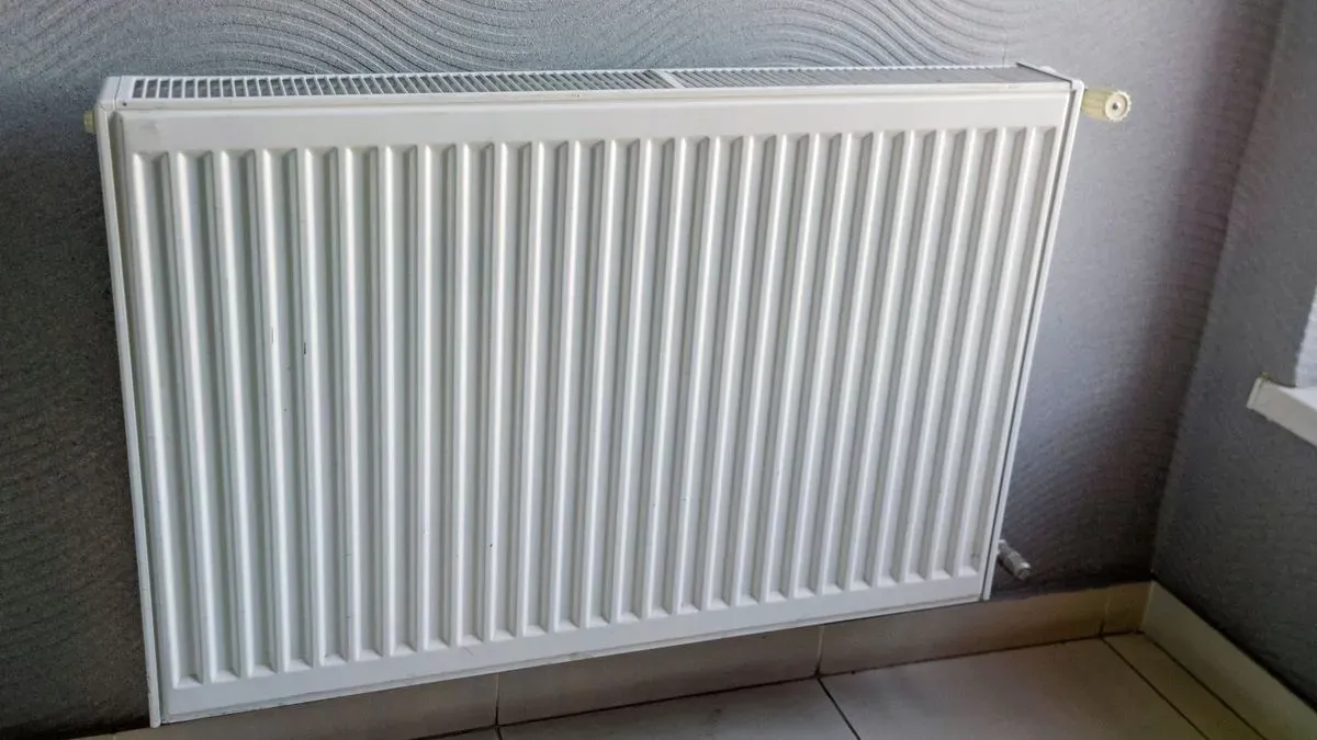 Radiator installation process in progress in Clapham