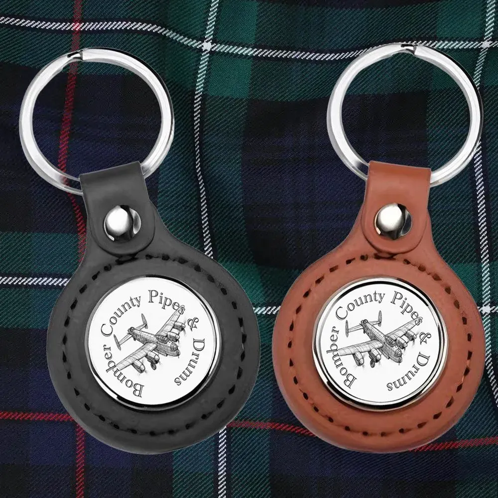 8227724652317-0xkmpa3wnlar75bof6o3cex-Black-Logo-Keyring thumbnail image