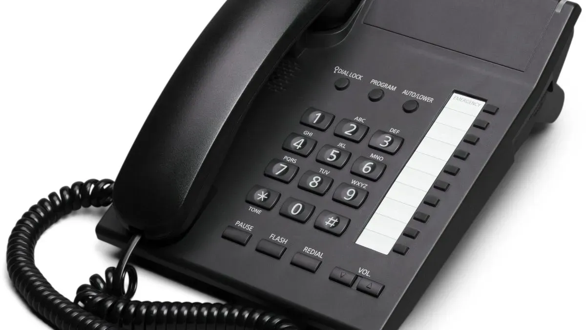 Northcomm technician installing Business Telephone Services in Belfast