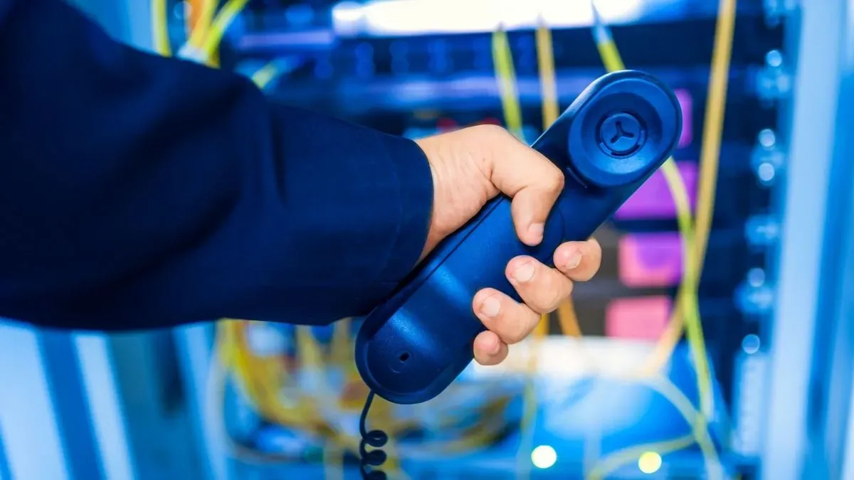 Business owners discussing VoIP solutions in Bangor