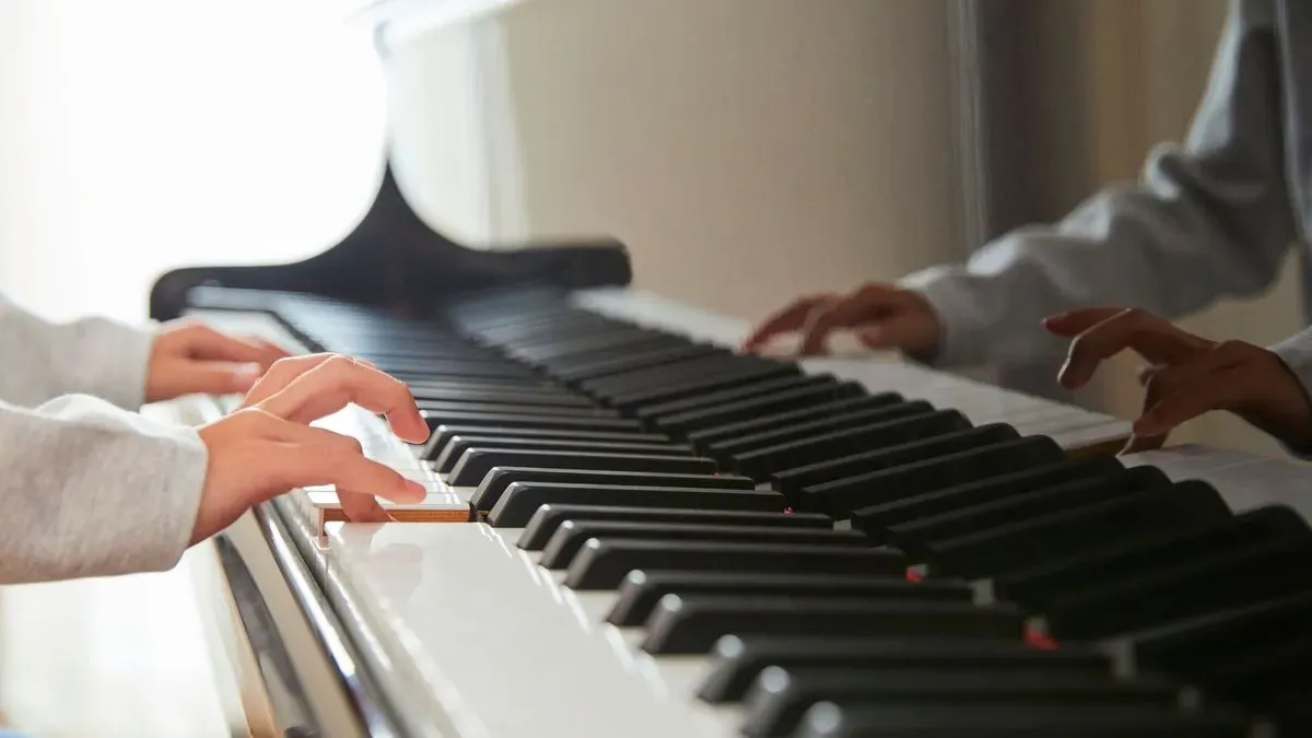 Student taking piano lessons in Chadwell St Mary