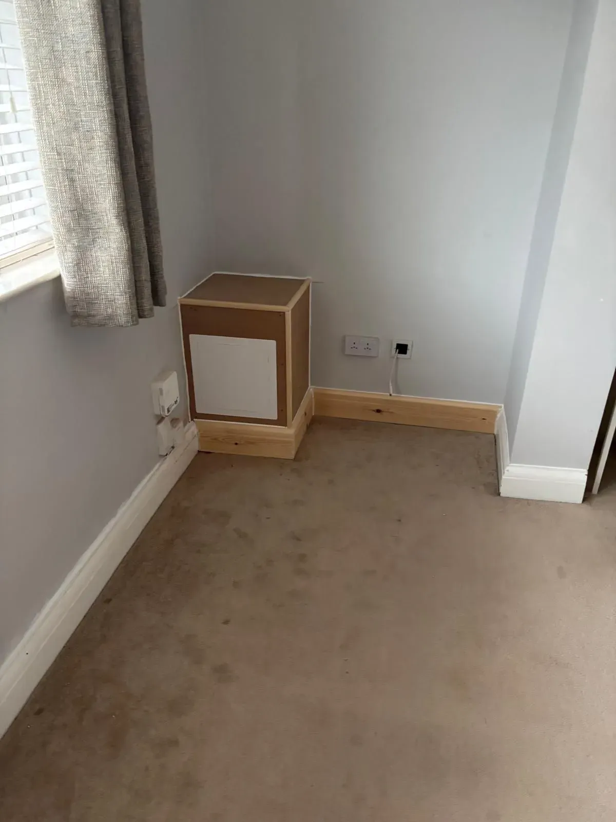 Team assessing damp issues in a local Crewe home