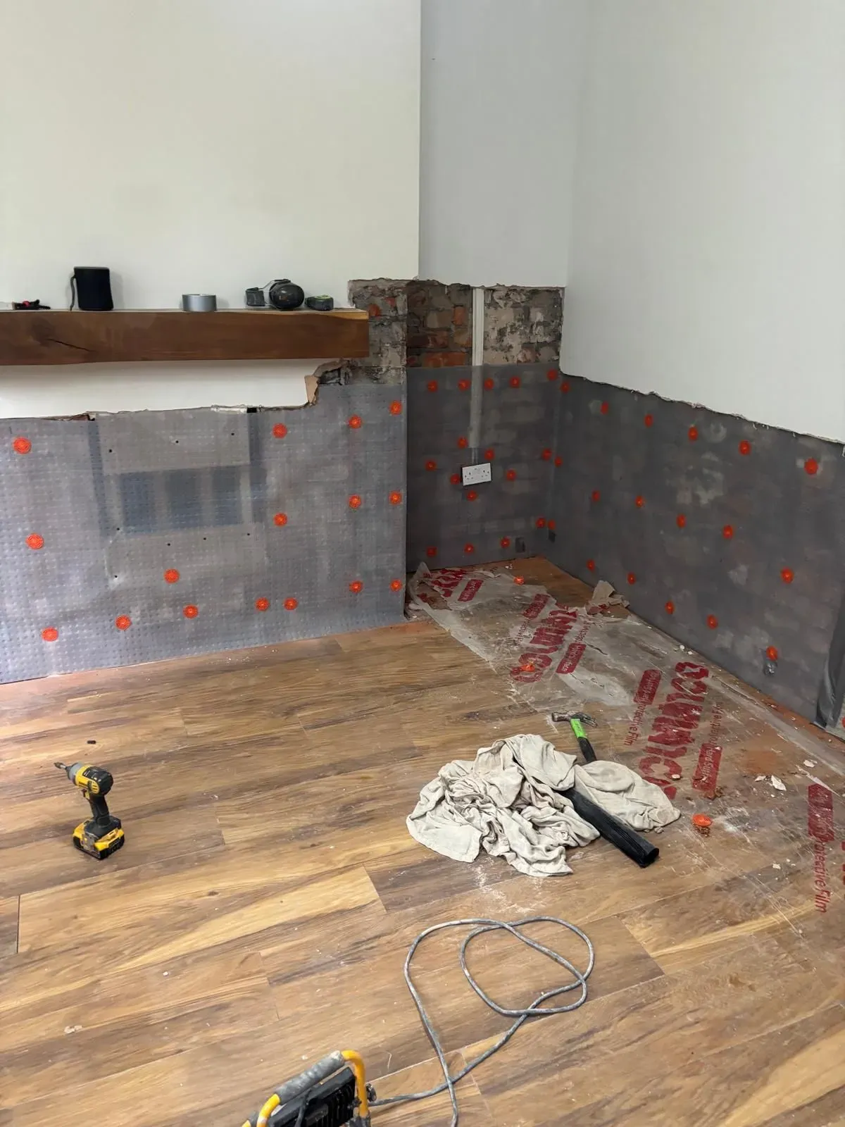 Handyman doing electrical repairs in Cheshire home