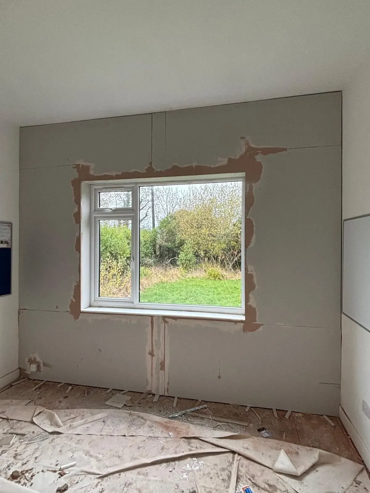 Experienced handyman painting a room in Marple